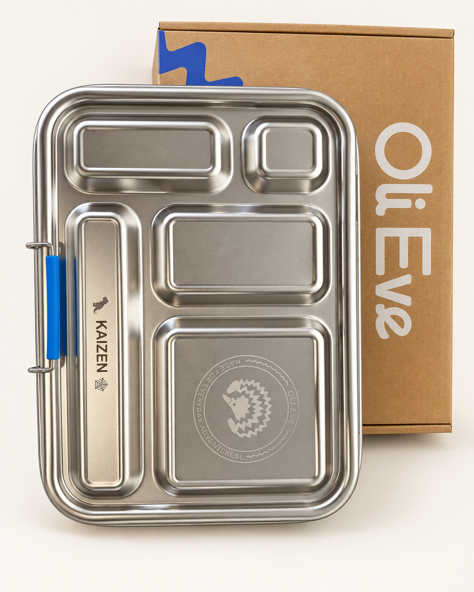 A real Oli Eve stainless steel lunchbox engraved with Kaizen’s name and chosen icons