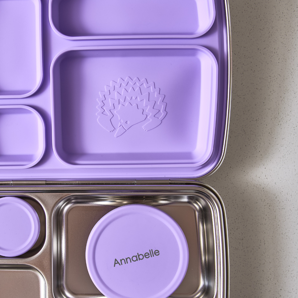 Close up of the Oli Eve Echidna branding on a stainless steel lunchbox